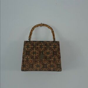 Elegant Patterned Handbag with Bamboo Handle